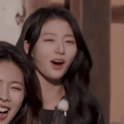Two Women Laughing One In Leather Jacket GIF