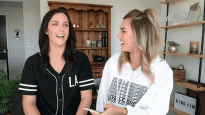 Two Women Laughing One Wearing LA Jersey GIF