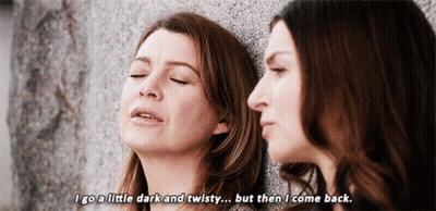 Two Women Leaning Against A Wall With One Saying " I Go A Little Dark And Twisty But Then I Come Back GIF