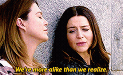 Two Women Leaning Saying We're More Alike GIF