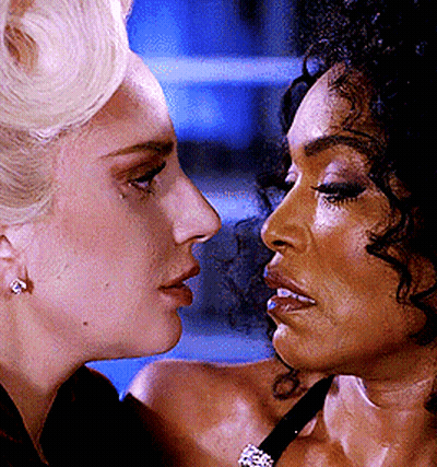 Two Women Looking At Each Other Eyes Closed GIF