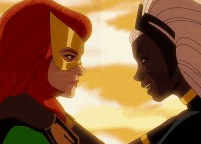 Two Women Looking at Each Other One Wearing Mask