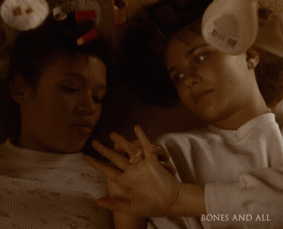 Two Women Lying Next To Each Other GIF