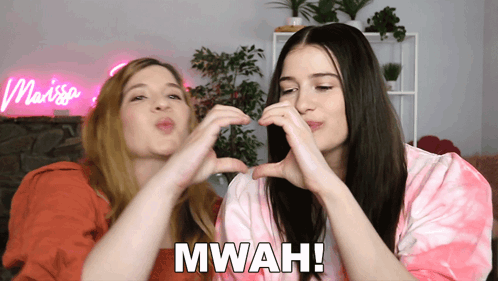 Two Women Making Heart Shape GIF