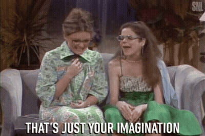 Two Women On Couch Says That's Just Your Imagination GIF