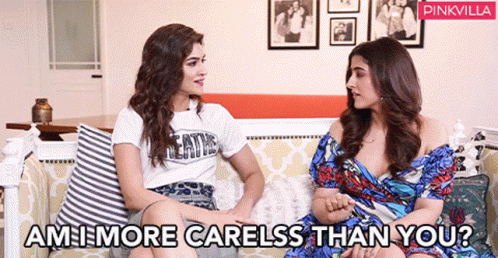 Two Women On Couch With Am More Careless Than You GIF