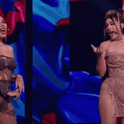 Two Women On Stage One Wearing Crown GIF