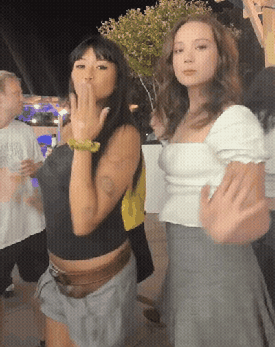 Two Women One Blowing A Kiss GIF