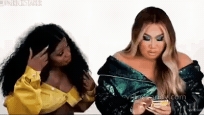 Two Women One Checking Cell Phone GIF