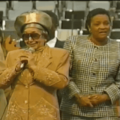 Two Women One Holding Microphone GIF