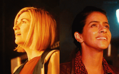Two Women One Smiling One Looking Up GIF