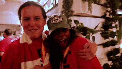 Two Women Posing One Wearing Puma Hat GIF