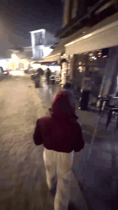 Two Women Running In Woods One With Heart Shirt GIF