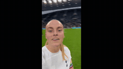 Two Women Selfie Soccer Field One Tottenham Shirt GIF