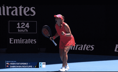 Two Women Shaking Hands On Tennis Court In Front Of Emirates GIF