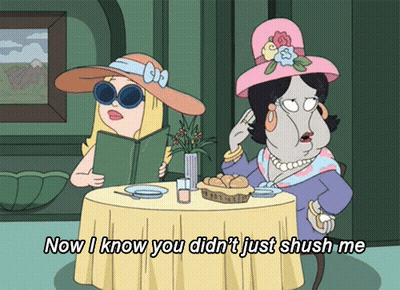 Two Women Sit At A Table With The Words Now I Know You Did N't Just Shush Me Below Them GIF