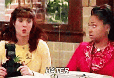 Two Women Sitting At Table Hater GIF