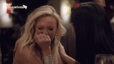 Two Women Sitting At Table Saying Real Housewives GIF