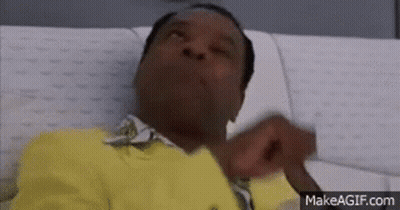 Two Women Sitting At Table With Food And Drinks GIF
