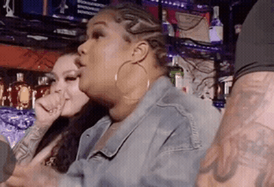 Two Women Sitting In Bar Talking GIF