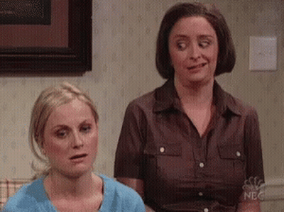 Two Women Sitting In Living Room GIF