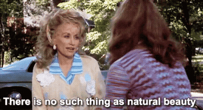 Two Women Sitting Next To Car Talking GIF