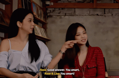 Two Women Sitting Next To Each Other GIF