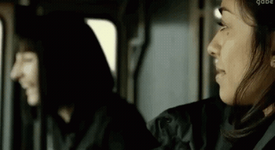 Two Women Sitting Next To Each Other In Car GIF
