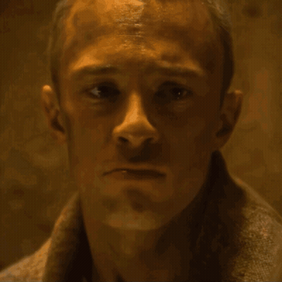 Two Women Sitting Next To Each Other In Restaurant GIF