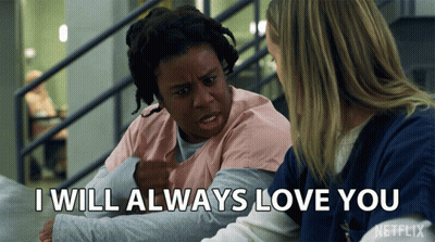 Two Women Sitting Next To Each Other With The Words I Will Always Love You GIF