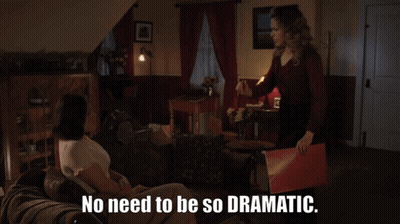 Two Women Sitting On A Couch With The Words " No Need To Be So Dramatic " GIF