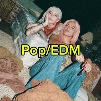 Two Women Sitting On A Couch With The Words Pop / Edm Written On The Bottom GIF