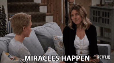 Two Women Sitting On Couch Saying Miracles Happen GIF
