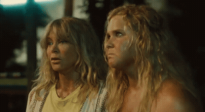 Two Women Sitting Together GIF