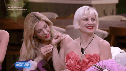 Two Women Sitting Together Gfvip GIF