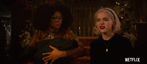 Two Women Sitting With Netflix Logo GIF