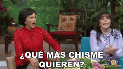 Two Women Sitting With Que Mas Chisme Quieren GIF