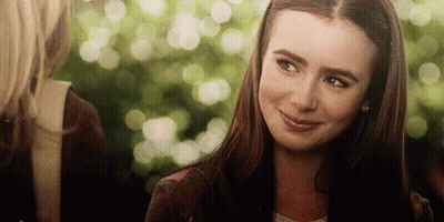 Two Women Smiling At Camera GIF