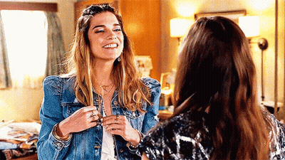 Two Women Smiling At Each Other GIF