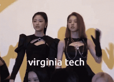 Two Women Standing Beside Virginia Tech GIF