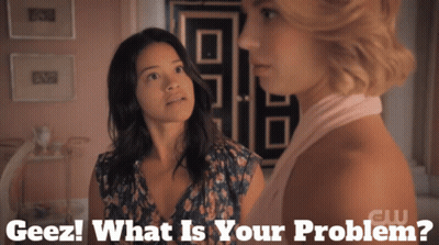 Two Women Standing Geez What Is Your Problem GIF