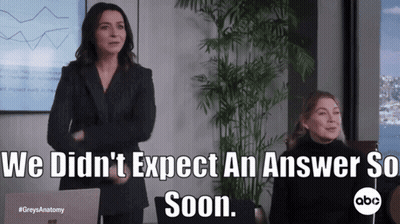 Two Women Standing In Front Of A Laptop With The Words We Did N't Expect An Answer So Soon Below Them GIF
