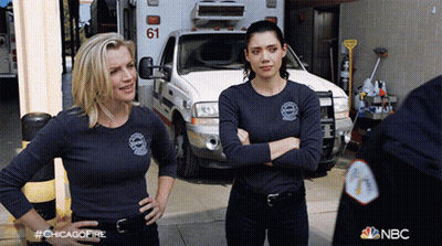 Two Women Standing In Front Of Ambulance 61 GIF