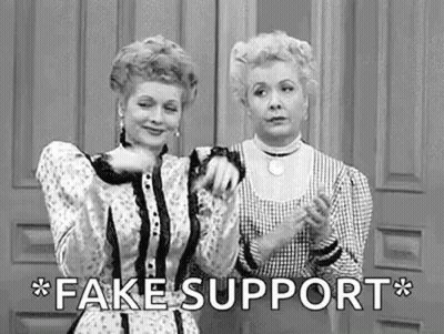 Two Women Standing In Front Of Door Saying Fake Support GIF