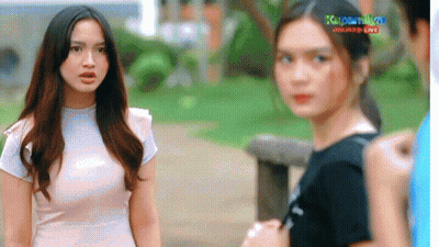 Two Women Standing In Front Of Kupatan Live Online Live Screen GIF