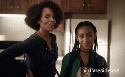Two Women Standing Next To Each Other In A Kitchen With The Hashtag Tvresidence GIF