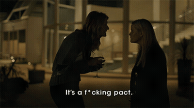 Two Women Standing Next To Each Other Saying It's A F*cking Pact GIF
