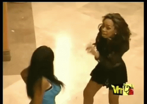 Two Women Standing Next To Each Other With A Vh1 Logo On The Bottom GIF