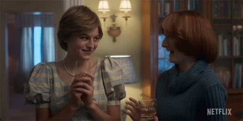 Two Women Standing Next To Each Other With Netflix Written On The Bottom GIF