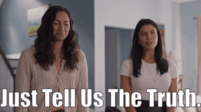 Two Women Standing Next To Each Other With The Words Just Tell Us The Truth Written Below Them GIF
